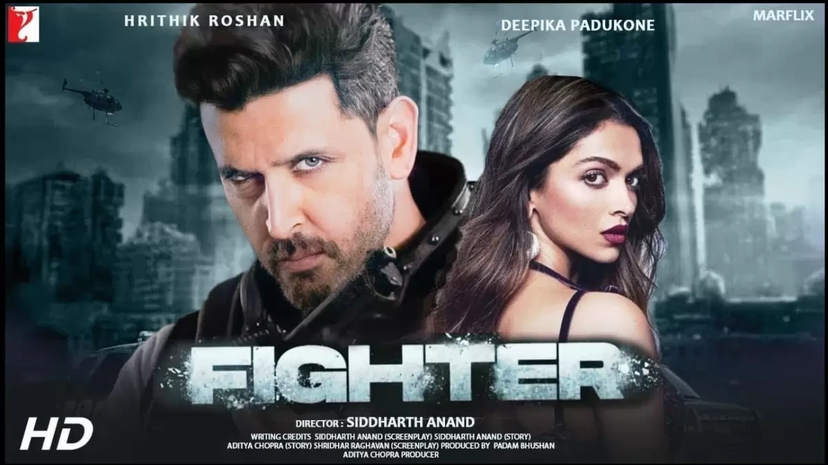 A dynamic duo, the leads of 'Fighter,' caught in a candid moment on-screen, showcasing Bollywood's blend of romance and action.